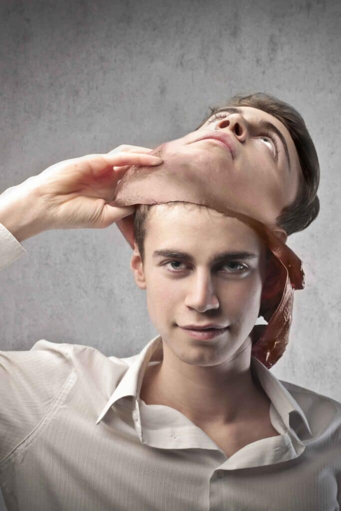 A man holds his head up with his hands, suggesting deep thought or concern.